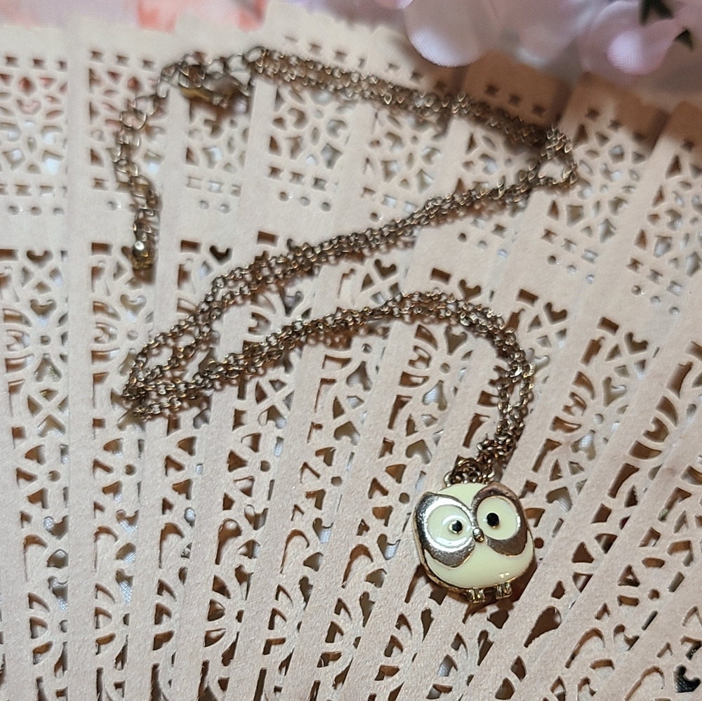 Owl charm on necklace